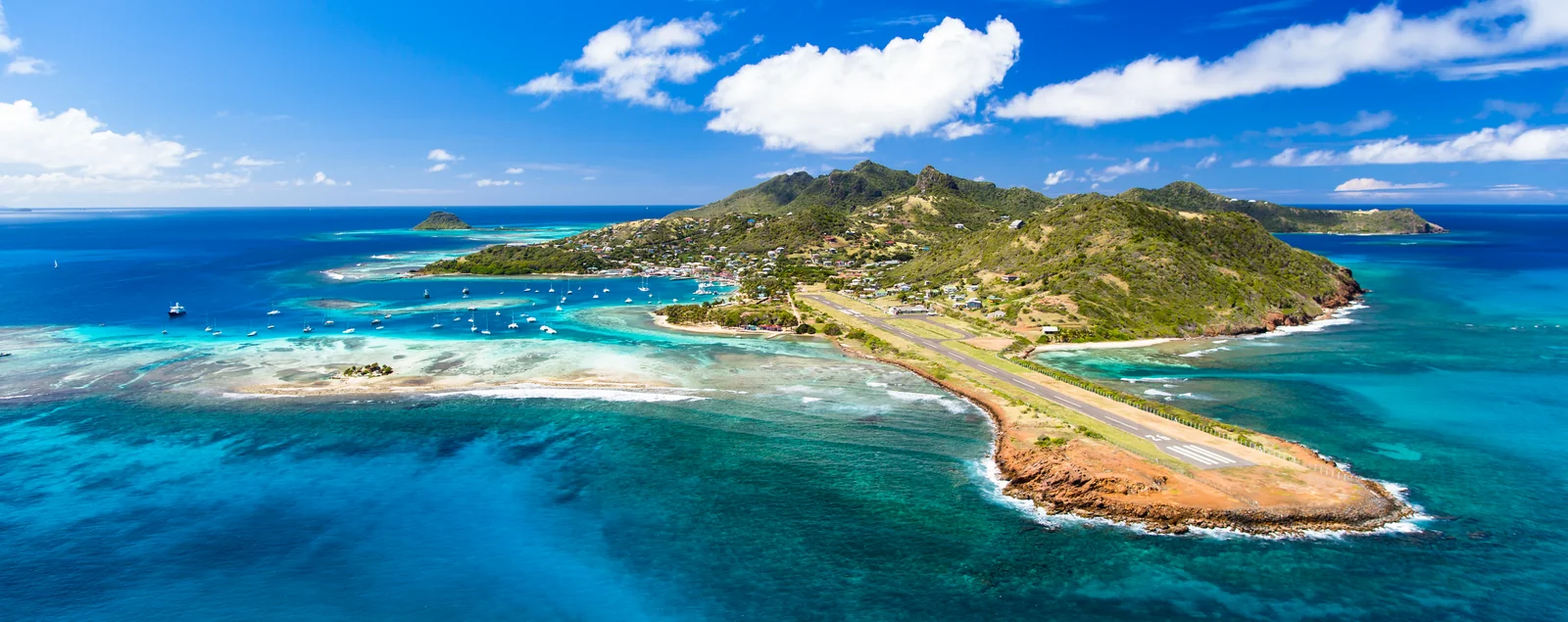 Aerial view of Union Island, its hills, Clifton and the surrounding sea