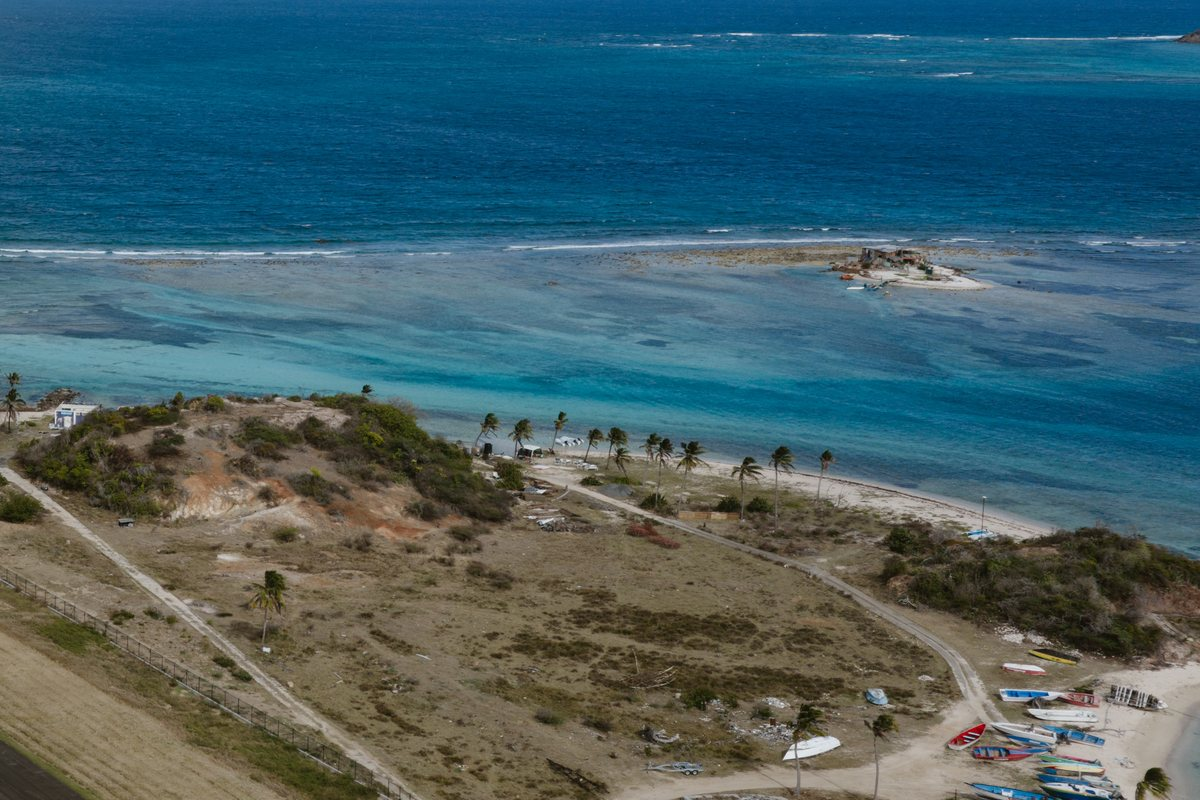 Aerial view toward Thompson Island and the reef near Union Island airport