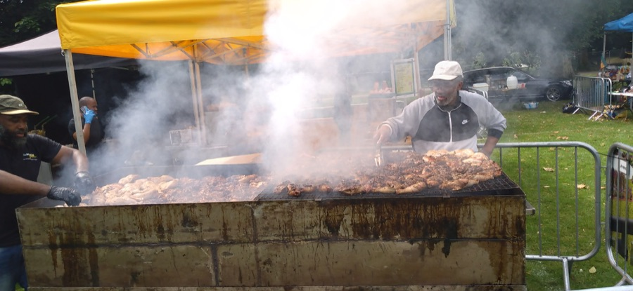 Local barbecue chicken on the grill for casual Union Island food